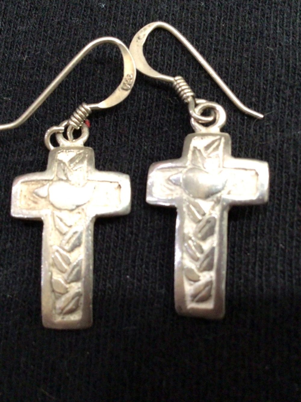 Sterling 925 silver cross earrings. With scrolling detail.
